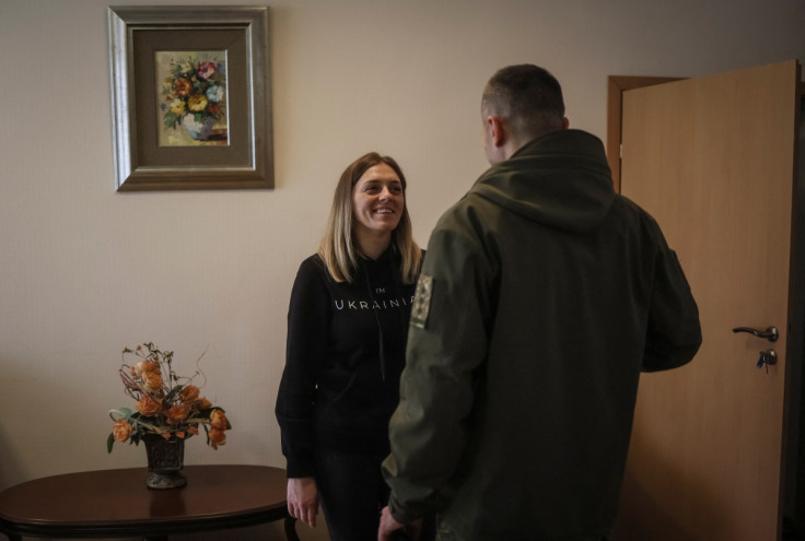 Ukrainian border guard colonel Padytel and cynologist Panina, captured during the Azovstal steelworks siege in Mariupol in May and released in the recent POW exchange  speaks with her counterpart in undisclosed location