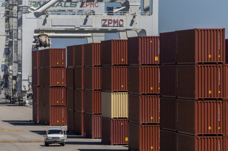 Shipping containers are seen are at a terminal of the Port of Oakland, California