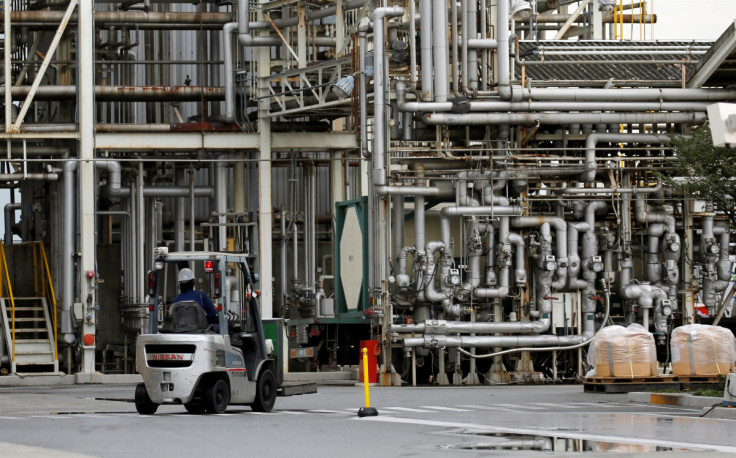 Man works in a factory at the Keihin industrial zone in Kawasaki