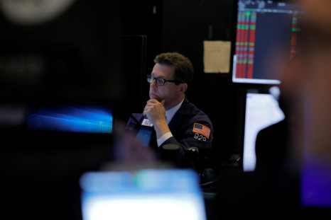 A trader works on the trading floor at the New York Stock Exchange (NYSE) at the opening of the market in New York City