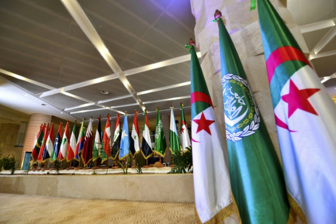 Flags of Arab League nations displayed at the convention center slated to host the Heads of State summit, in Algeria's capital Algiers
