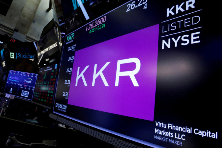 KKR & Co trading information is displayed on a screen on the floor of the NYSE in New York