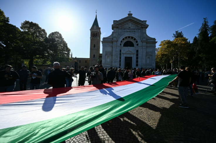 Police did not move against 2,000 people who gathered in Benito Mussolini's birth and burial place of Predappio to remember Italy's fascist dictator