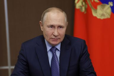 Russian President Vladimir Putin chairs a meeting in Sochi
