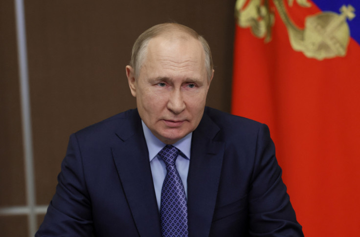 Russian President Vladimir Putin chairs a meeting in Sochi