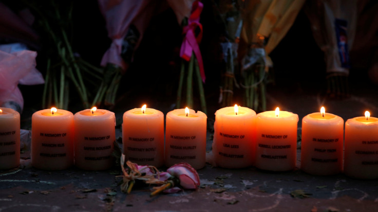 Candles burn with the names of the dead during the first anniversary of the Manchester Arena bombing, in Manchester