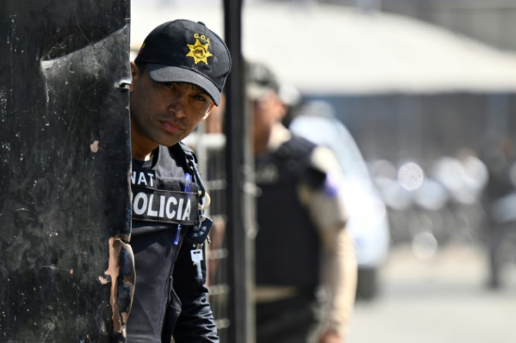 A member of the Ecuadorian police is seen outside the Guayas 1 prison on November 4, 2022