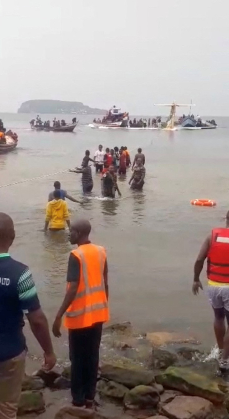 People pull Precision Air plane out of Lake Victoria