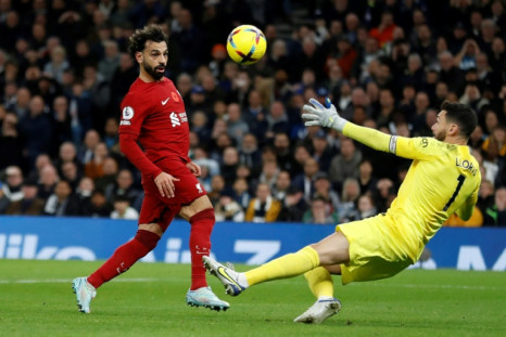 Two good: Mohamed Salah (left) scored twice in Liverpool's 2-1 win at Tottenham