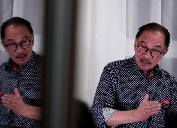 Malaysian opposition leader Anwar Ibrahim speaks during an interview in Tambun