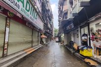A closed restaurant and shops are seen in Guangzhou's Xiaobei neighborhood