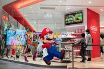 Nintendo has raised its profit forecast on a weak yen and strong games sales