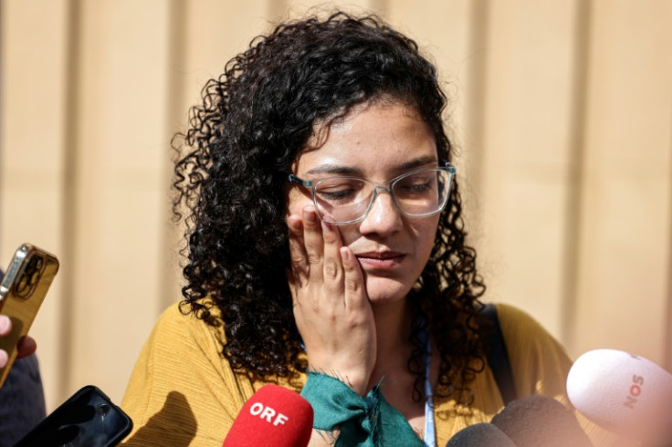 Sanaa Seif, sister of imprisoned British-Egyptian activist Alaa Abdel Fattah, speaks to reporters after a press conference hosted by the Global Campaign to Demand Climate Justice on the sidelines of the COP27 in Egypt