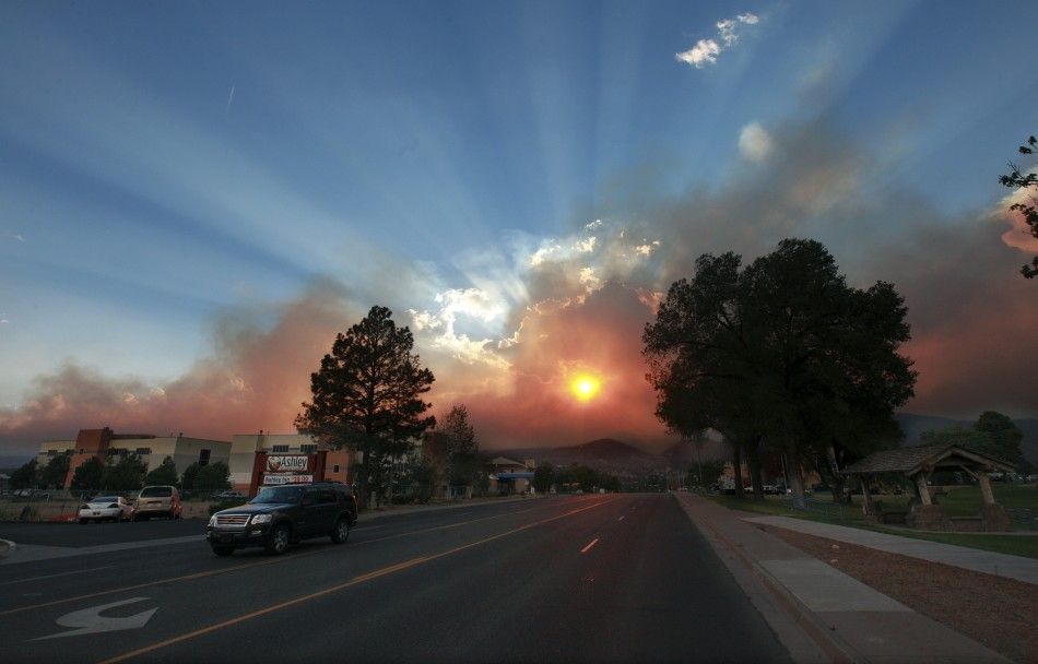 Sun shines through the smoke from the Las Conchas wildfire in Los Alamos