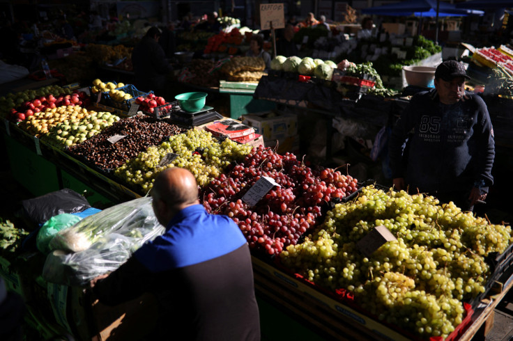 Seller Simeonov waits for customers at Krasno Selo market in Sofia