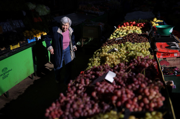 Woman shops for food items at Krasno Selo market in Sofia