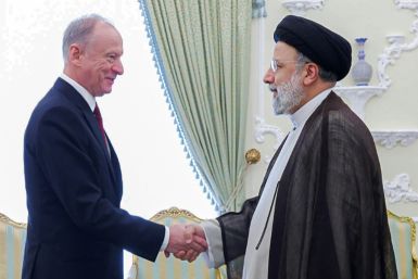 Iran's President Ebrahim Raisi on Wednesday met Russia's Secretary of the Security Council Nikolai Patrushev in Tehran, as seen in this picture provided by the Iranian presidential office