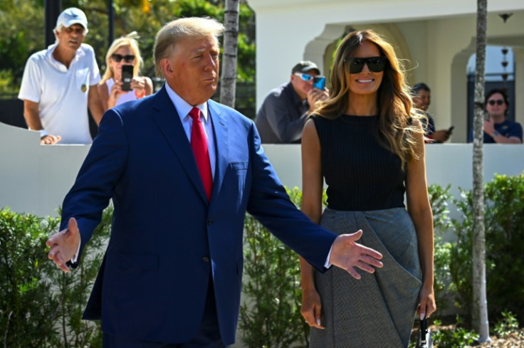Former US President Donald Trump and his wife Melania Trump speak to reporters after casting their ballot in Palm Beach, Florida