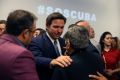 Governor Ron DeSantis of Florida greets people after holding a roundtable discussion at the American Museum of the Cuba Diaspora in Miami in July 2021