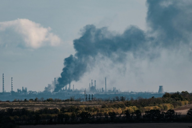 Black smoke rises near Slovianska power station in the Donetsk region on October 13, 2022, amid the Russian invasion of Ukraine