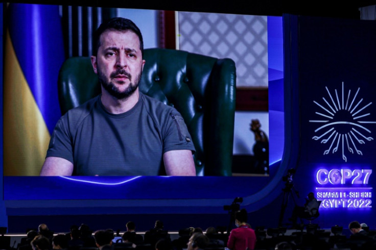 Ukrainian President Volodymyr Zelensky delivers a speech by video link to the COP27 climate conference, on November 8, 2022