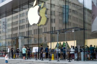 People enter an Apple store in Shanghai in June 2022 amid rising US calls to reduce reliance on China's giant economy