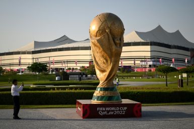 A giant replica of the World Cup trophy stands in front of the Al-Bayt Stadium where the tournament kicks off on November 20
