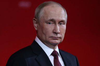 The Kremlin blamed Putin's absence on scheduling conflicts