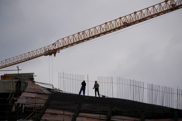 Workers work at a construction site, following the COVID-19 outbreak, in Shanghai