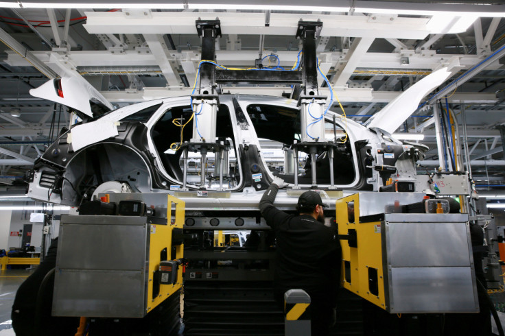 Workers assemble electric vehicles at the Lucid Motors plant in Casa Grande