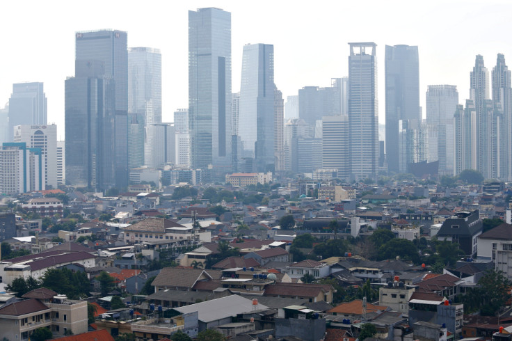 General view of business buildings as smog covers the capital city of Jakarta