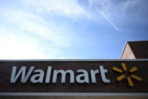 Walmart posted a loss in the third quarter after a settlement resolving claims that it contributed to the nationwide opioid crisis.