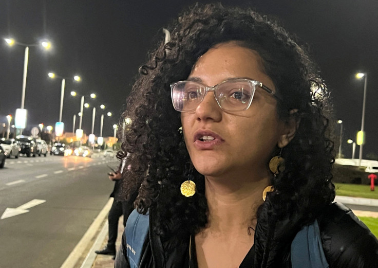 Sanaa Seif, sister of jailed Egyptian activist Alaa Abdel Fattah, speaks to Reuters upon her arrival to Sharm El-Sheikh