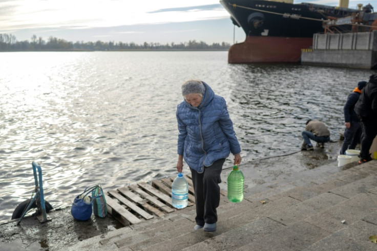 Local people are collecting water from the Dnipro river in Kherson, now a natural dividing line between Ukraine's forces and Russians on the opposing bank