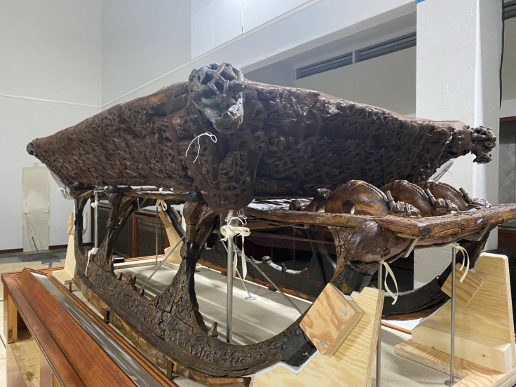 A wooden sleigh found during the Oseberg excavation is placed inside The Viking Ship Museum in Oslo
