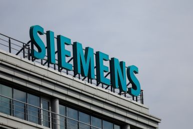 A sign with the logo of Siemens company is on display outside its office in Moscow