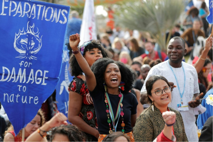 Climate activists protest outside the Sharm el-Sheikh International Convention Centre during the COP27 climate conference in Egypt on Thursday