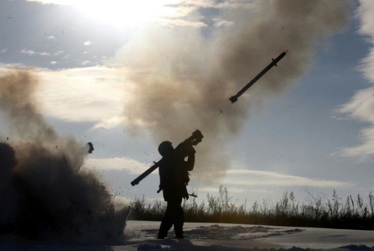 A Ukrainian soldier fires a surface-to-air missile during a military exercise in December 2014