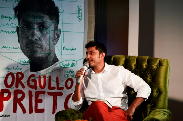 Mexican actor Tenoch Huerta speaks at the launch of his book "Orgullo Prieto" (Brown Pride) in Mexico City
