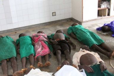 Bodies of children lie on the floor at a local morgue after they were killed when lightning hit a classroom at a school in Kiryandongo, 210 km (130 miles) north of Uganda&#039;s capital Kampala, June 29, 2011
