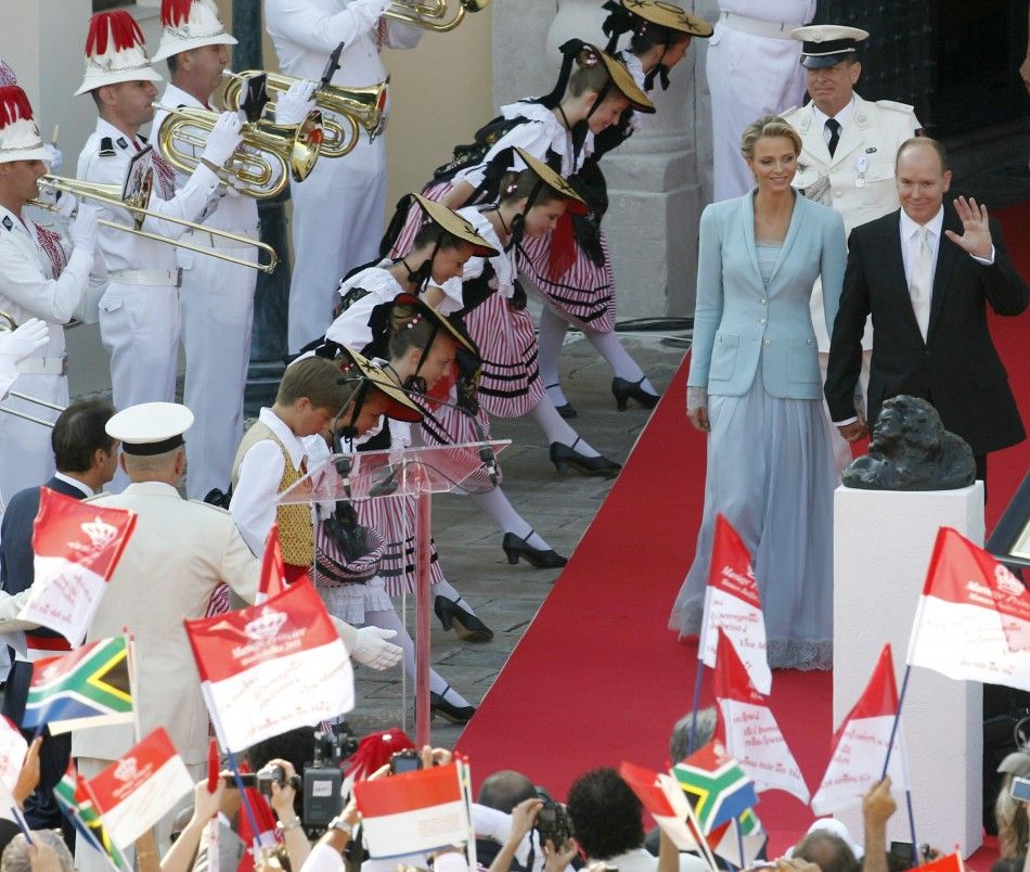 Newlyweds Prince Albert II of Monaco and Princess Charlene arrive on the Palace square after their civil wedding service in Monaco