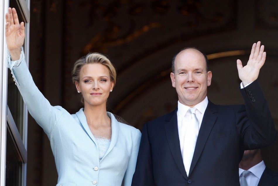  Newlyweds Prince Albert II of Monaco and Princess Charlene wave on the Palace balcony after the civil wedding service in Monaco