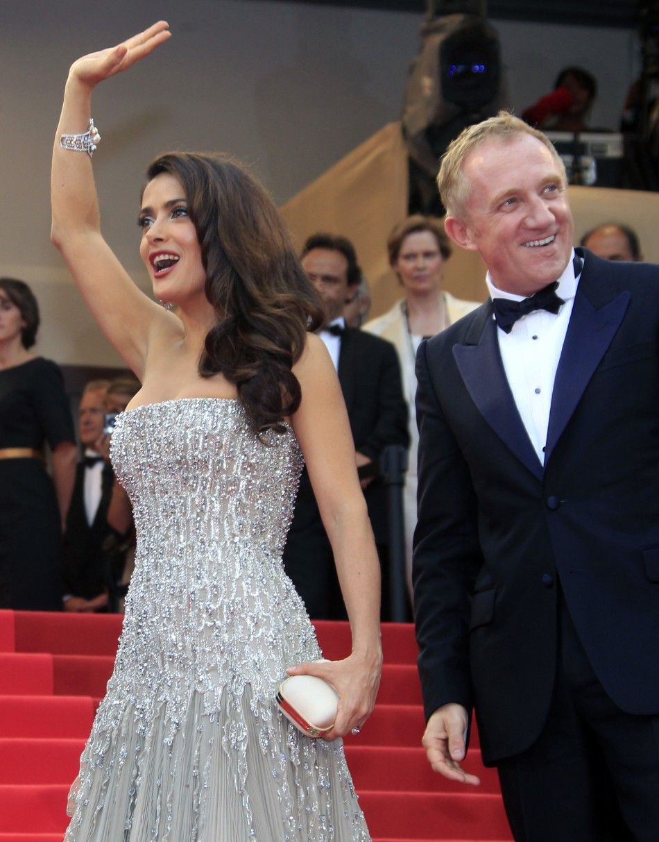 Pinault and his wife Hayek pose on the red carpet for the screening of quotMidnight In Parisquot by director Woody Allen and for the opening ceremony of the 64th Cannes Film Festival in Cannes