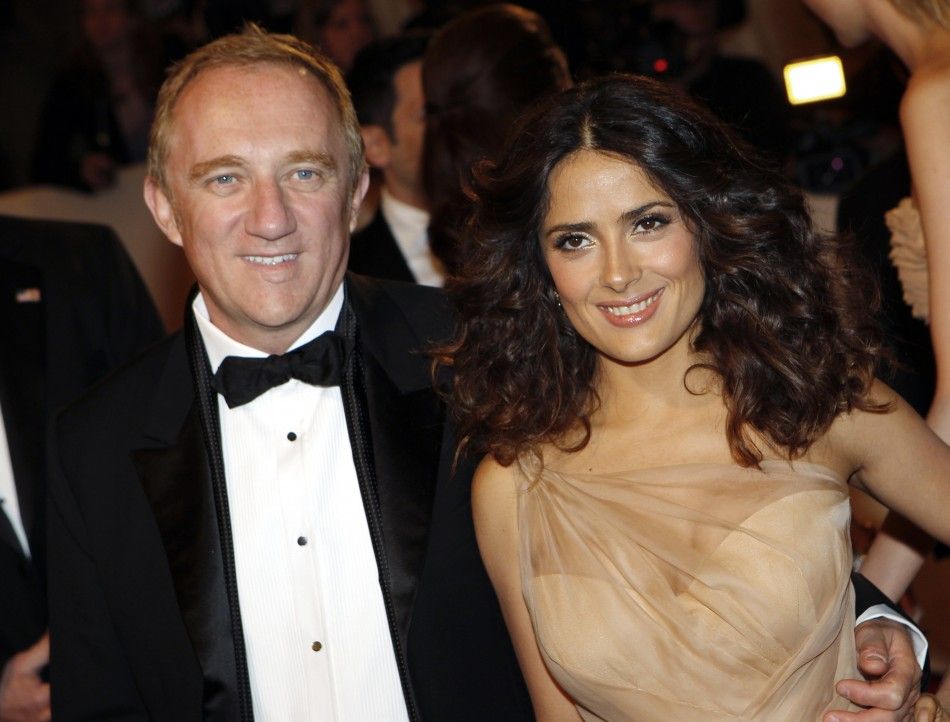 Francois-Henri Pinault and actress Salma Hayek pose on arrival at the Metropolitan Museum of Art Costume Institute Benefit celebrating the opening of Alexander McQueen Savage Beauty, in New York