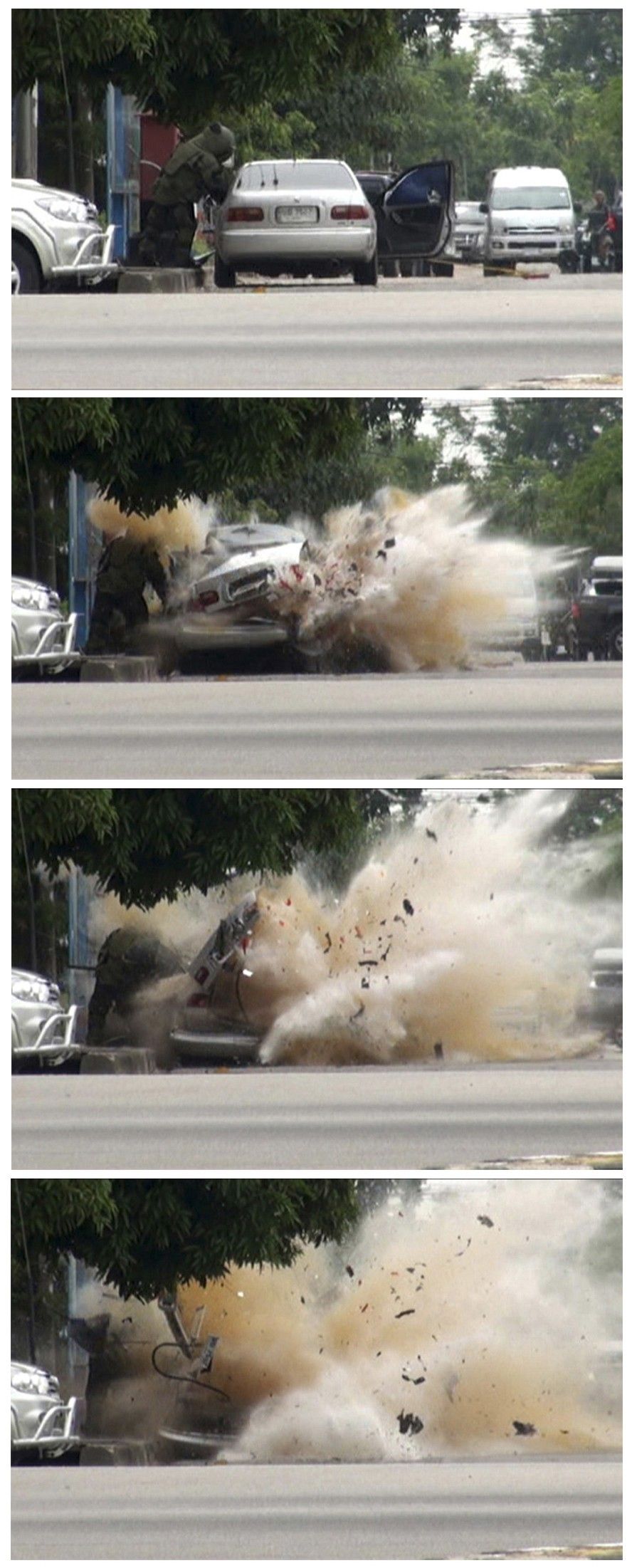 This combination photo shows a car bomb exploding as a member of a Thai bomb squad inspects it in Narathiwat province