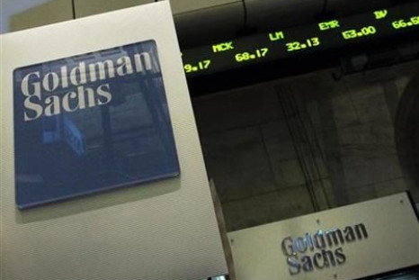 A Goldman Sachs sign is seen over a kiosk on the floor of the New York Stock Exchange