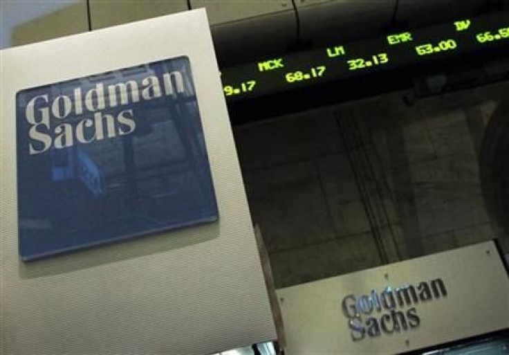 A Goldman Sachs sign is seen over a kiosk on the floor of the New York Stock Exchange