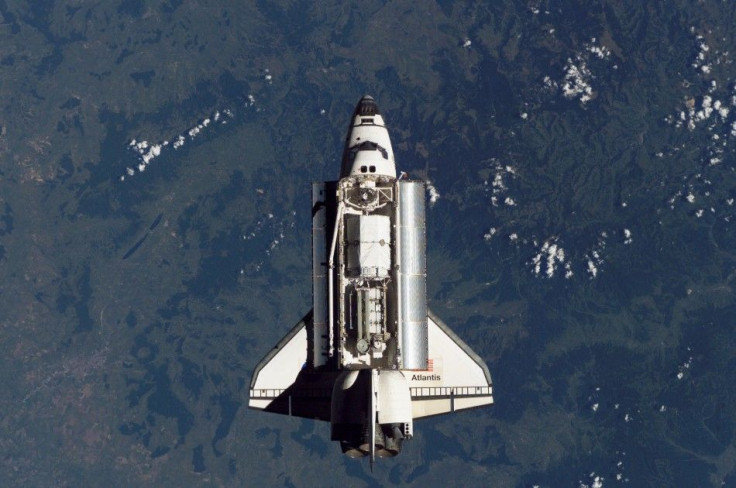 NASA handout photo of Atlantis near the ISS