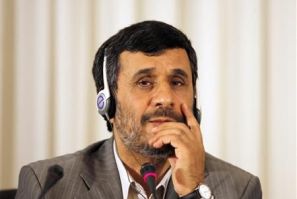 Iranian President Ahmadinejad listens to a journalist&#039;s question during his news conference in Istanbul