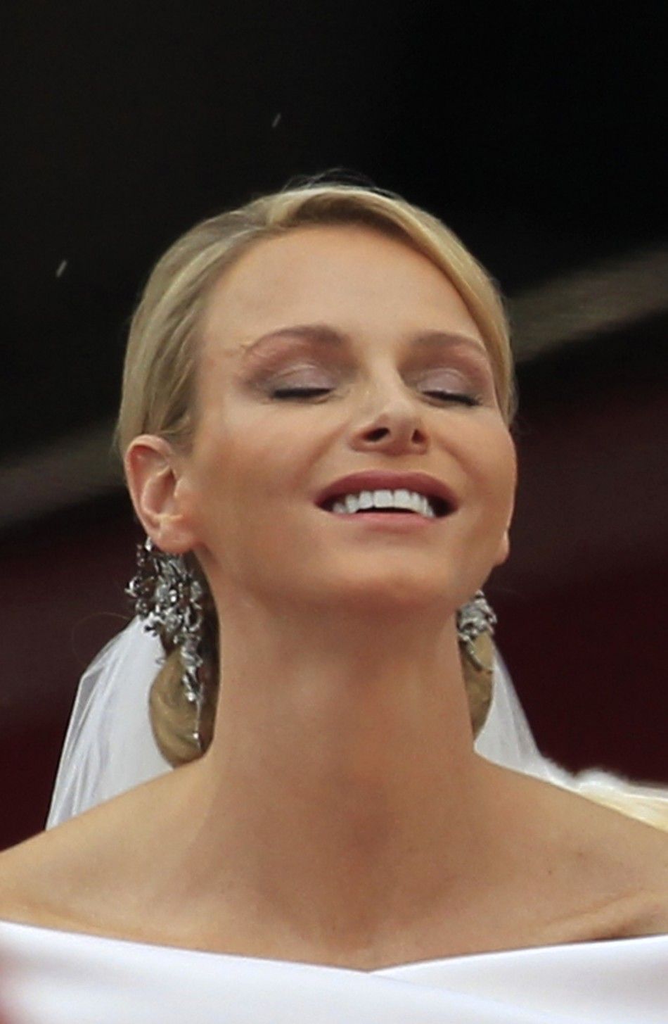 Monacos Princess Charlene, wife of Prince Albert II smiles after the religious wedding ceremony in at the Palace in Monaco